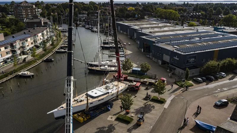 a large ship docked in a harbor aboard POLINA STAR IV Yacht for Sale