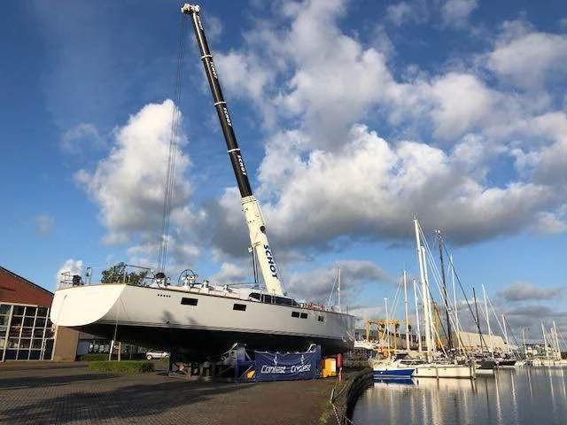 a large white boat with a crane on top aboard POLINA STAR IV Yacht for Sale
