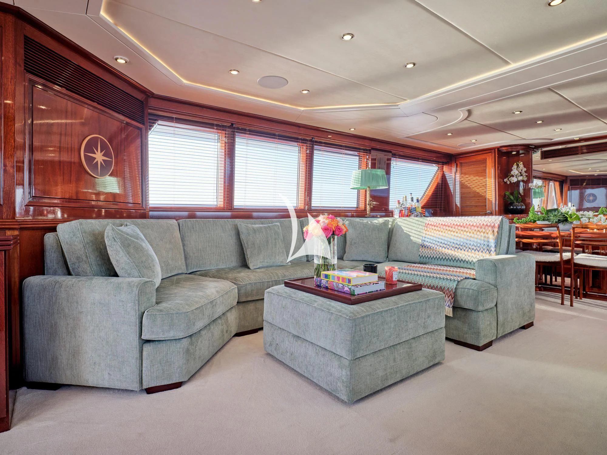 a living room with a couch and a coffee table aboard MIA ZOI Yacht for Charter