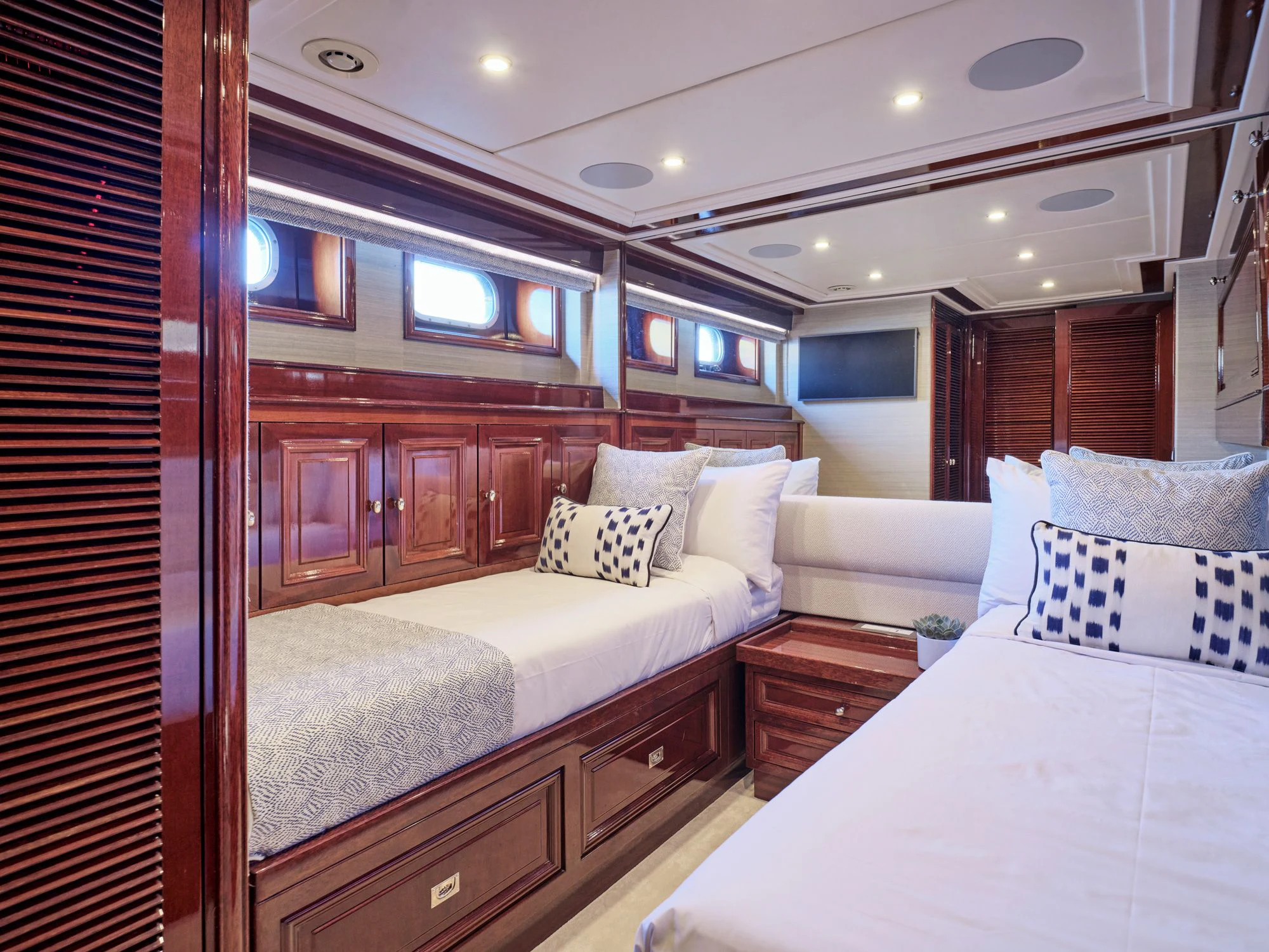 a room with a bed and a window aboard MIA ZOI Yacht for Charter