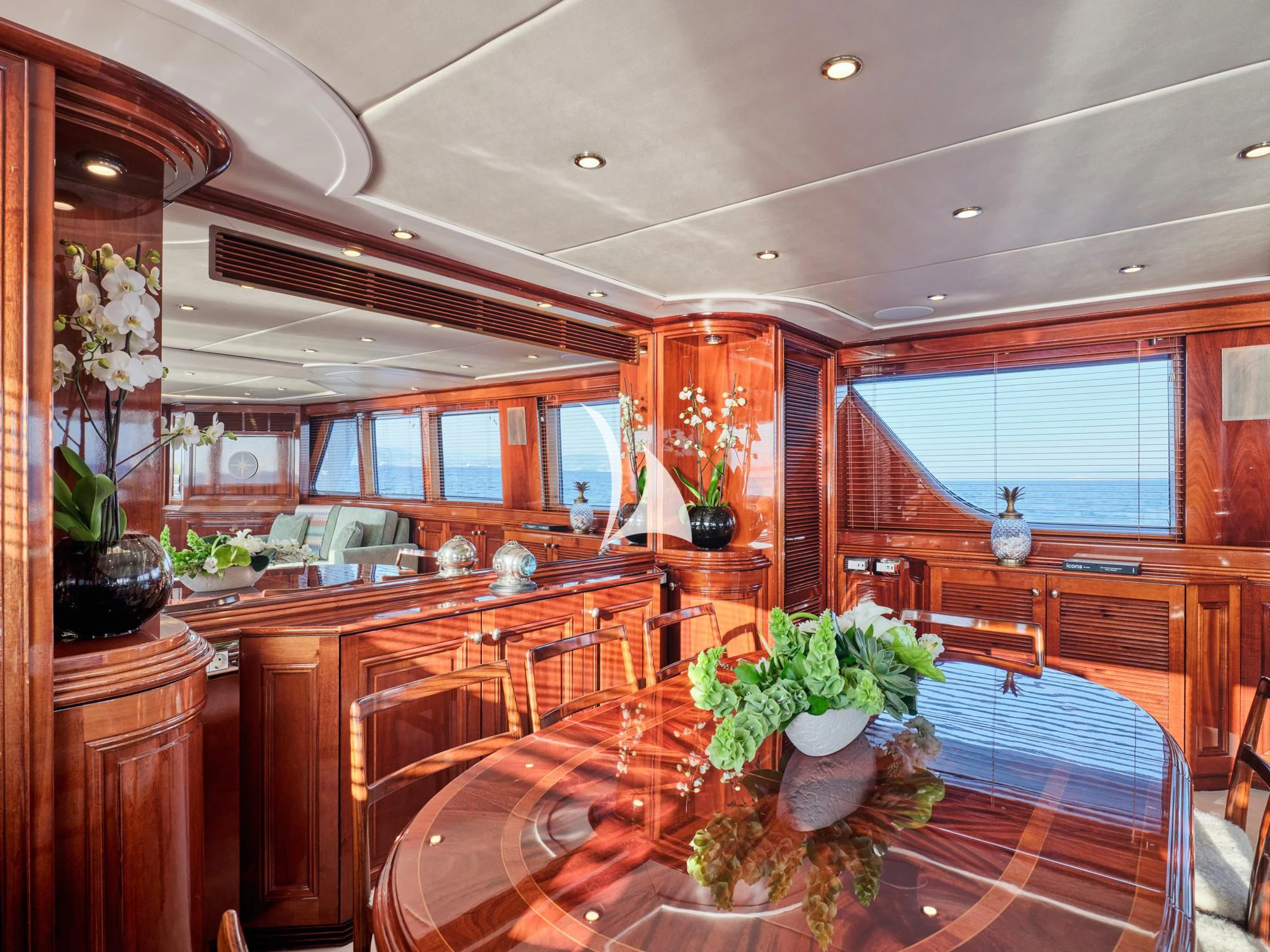 a large kitchen with a large table aboard MIA ZOI Yacht for Charter