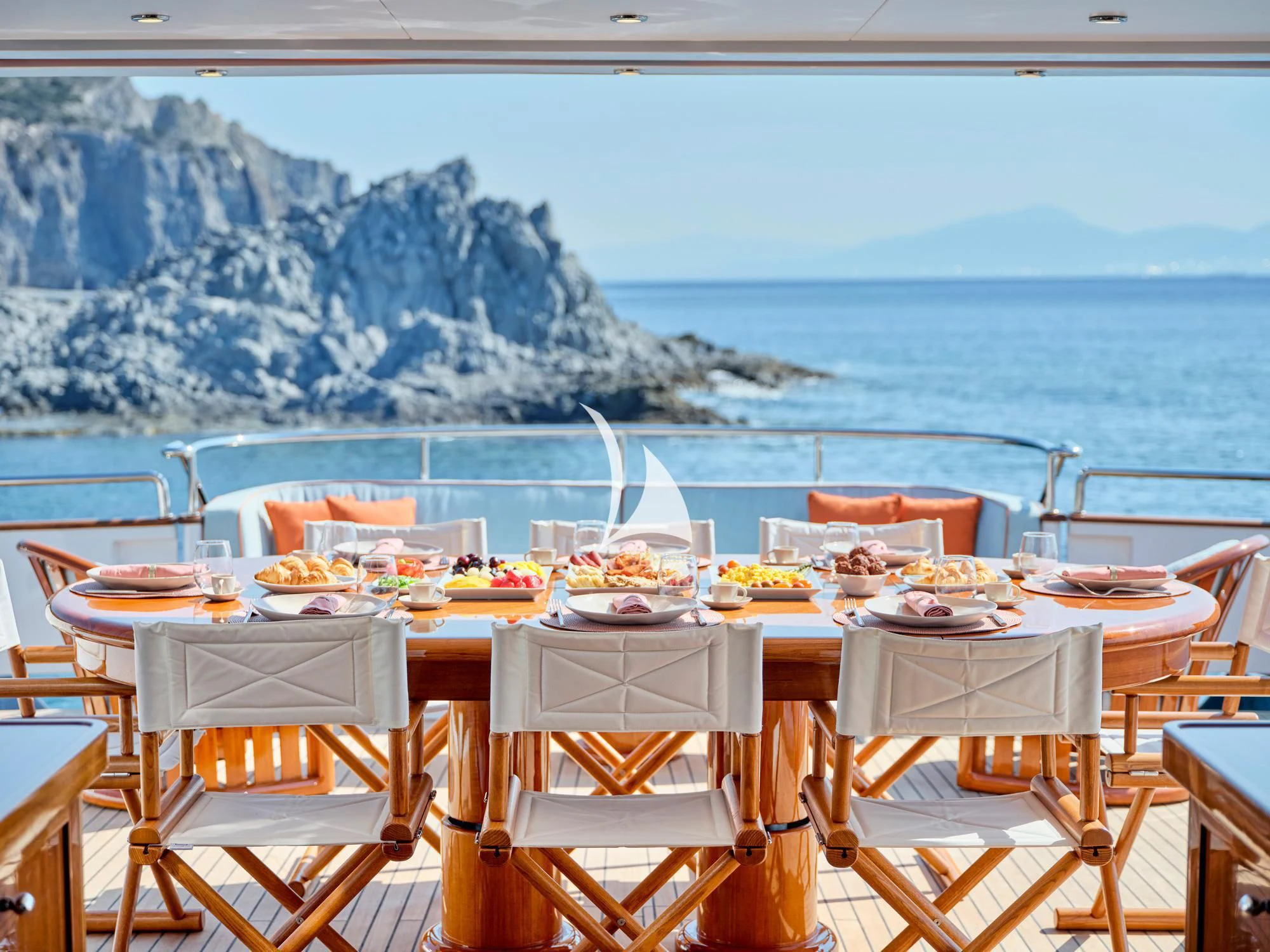 a table with food on it aboard MIA ZOI Yacht for Charter