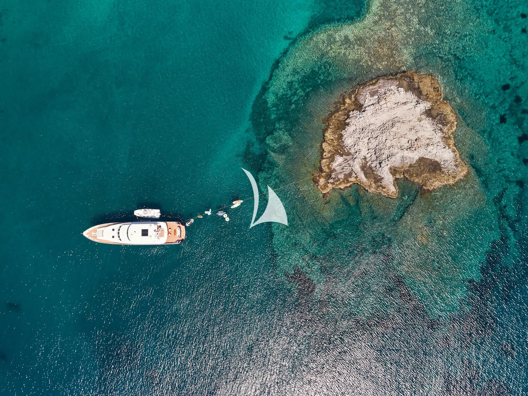 a group of boats in the water aboard MIA ZOI Yacht for Charter