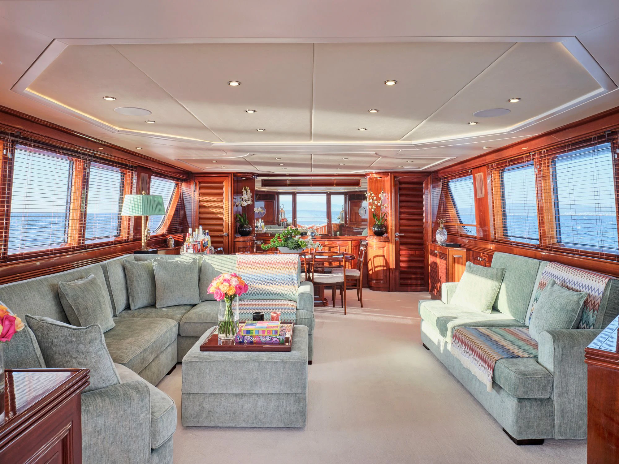 a living room with a couch and a table aboard MIA ZOI Yacht for Charter