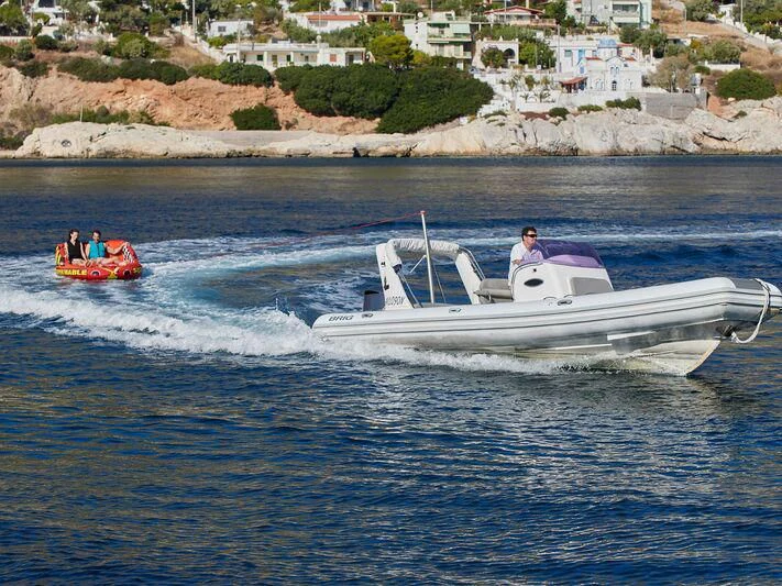 a boat is moving on the water aboard MIA ZOI Yacht for Charter