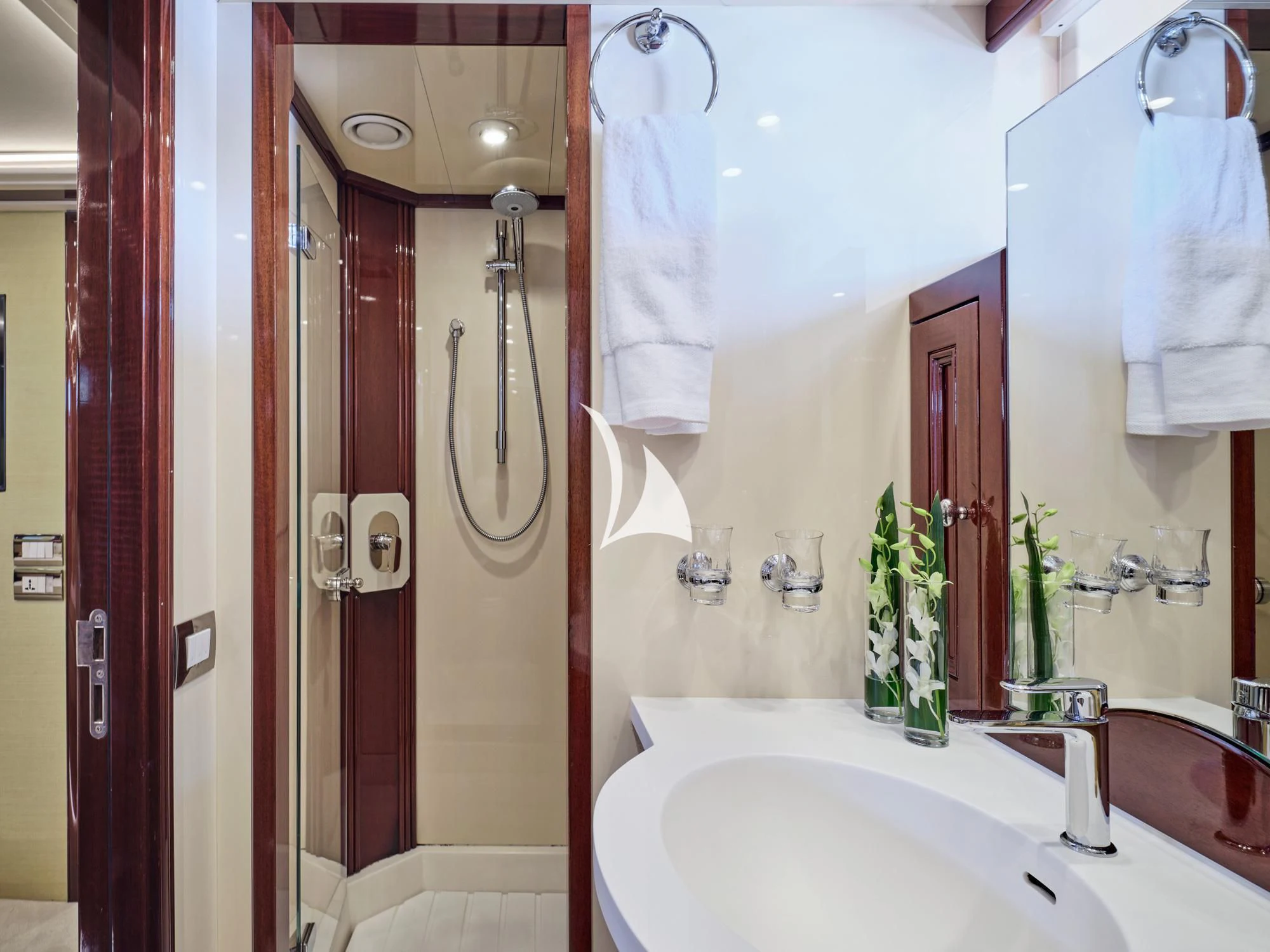a bathroom with a bathtub and shower aboard MIA ZOI Yacht for Charter