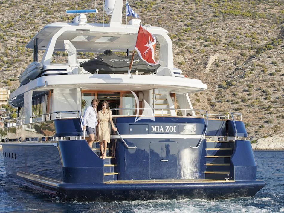 a couple on a boat aboard MIA ZOI Yacht for Charter