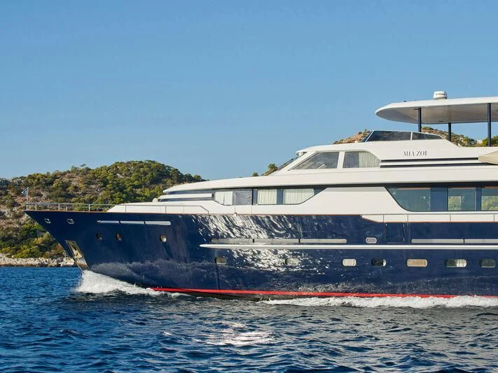 a large boat on the water aboard MIA ZOI Yacht for Charter
