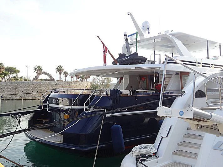 a boat docked at a pier aboard MIA ZOI Yacht for Charter