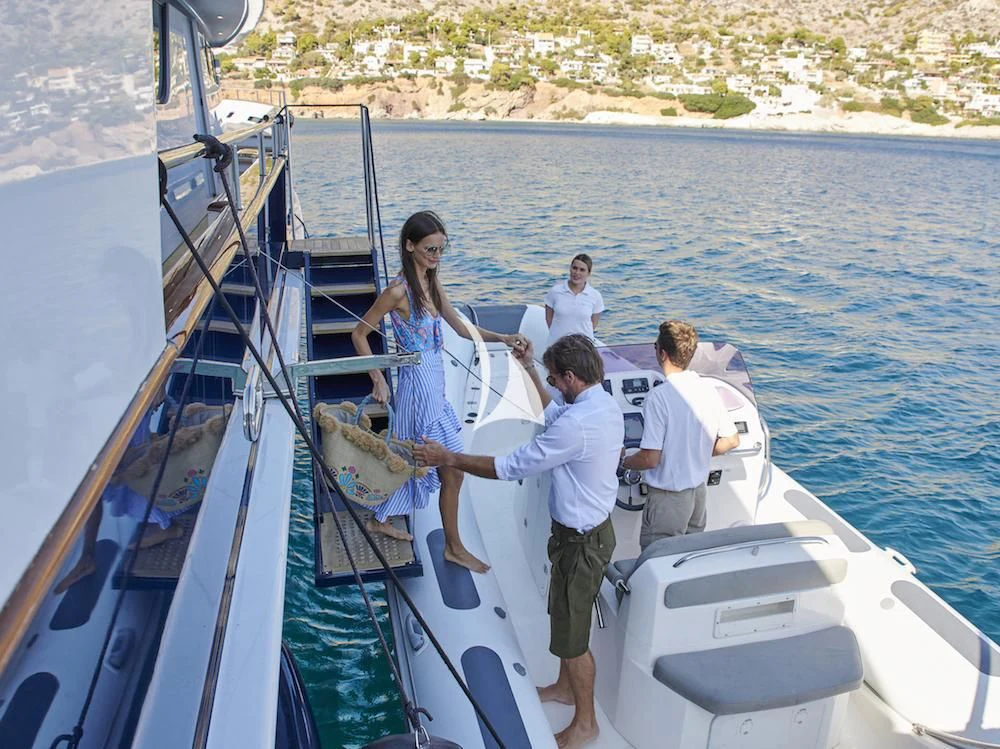 a group of people on a boat aboard MIA ZOI Yacht for Charter