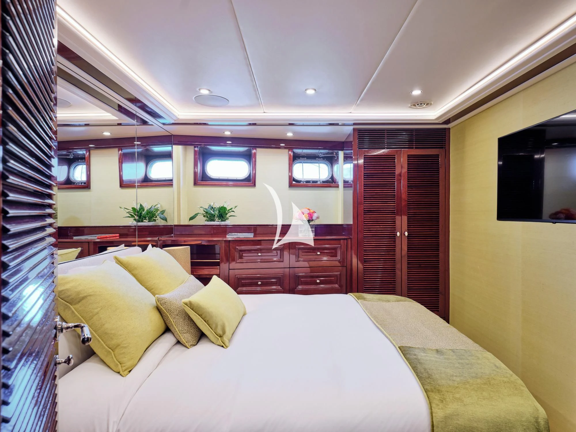 a bed in a room aboard MIA ZOI Yacht for Charter