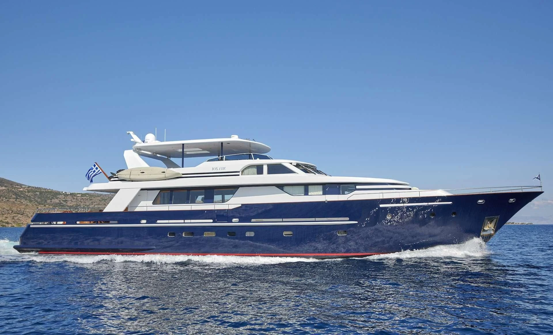 a large boat on the water aboard MIA ZOI Yacht for Charter