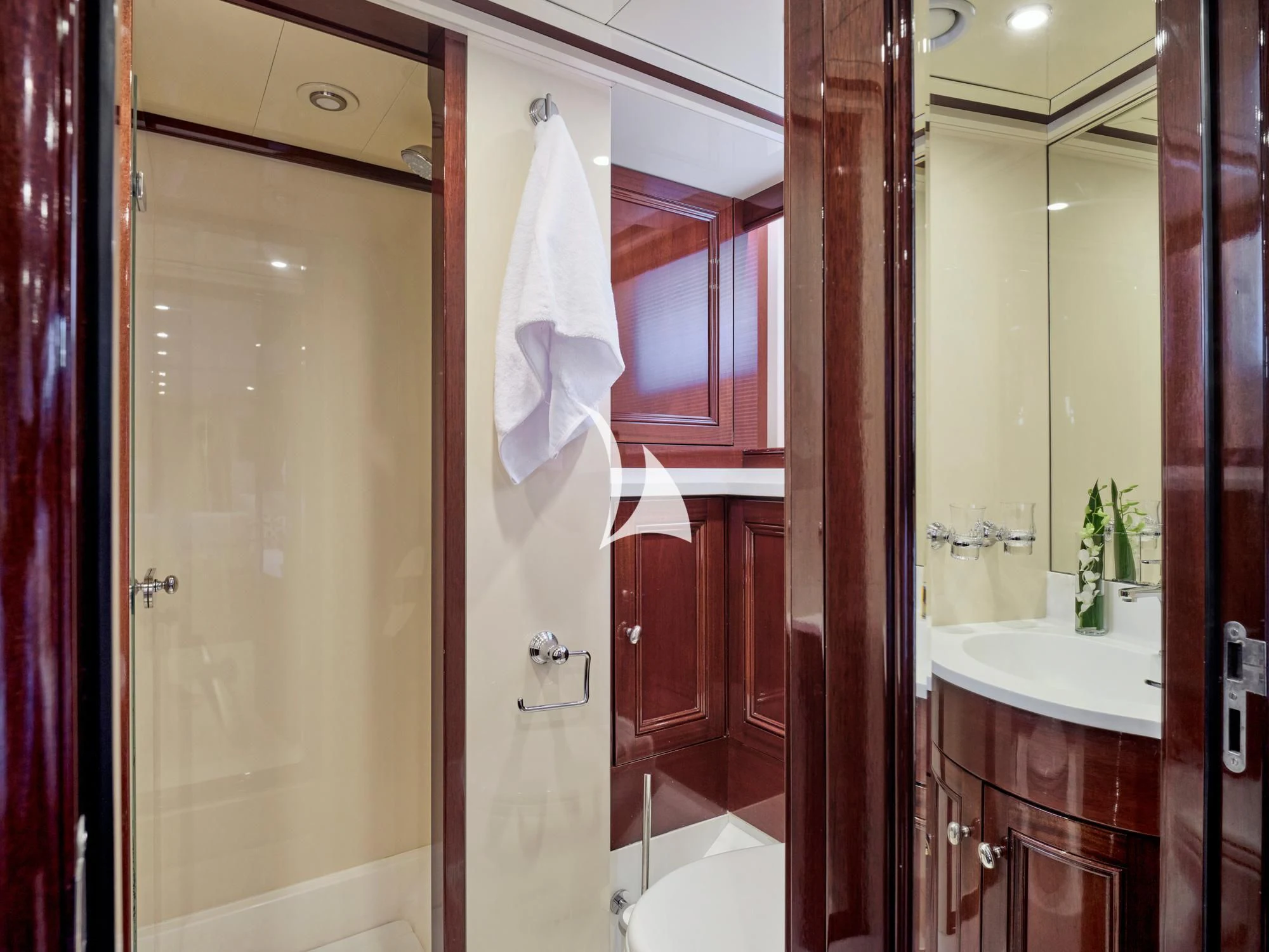 a bathroom with a sink and a shower aboard MIA ZOI Yacht for Charter