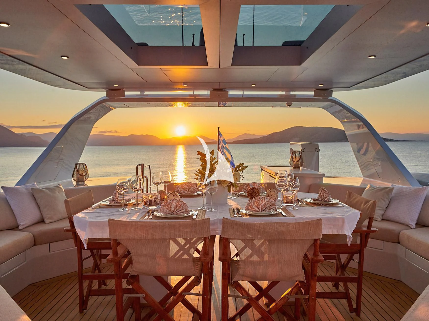 a dining table on a boat aboard MIA ZOI Yacht for Charter
