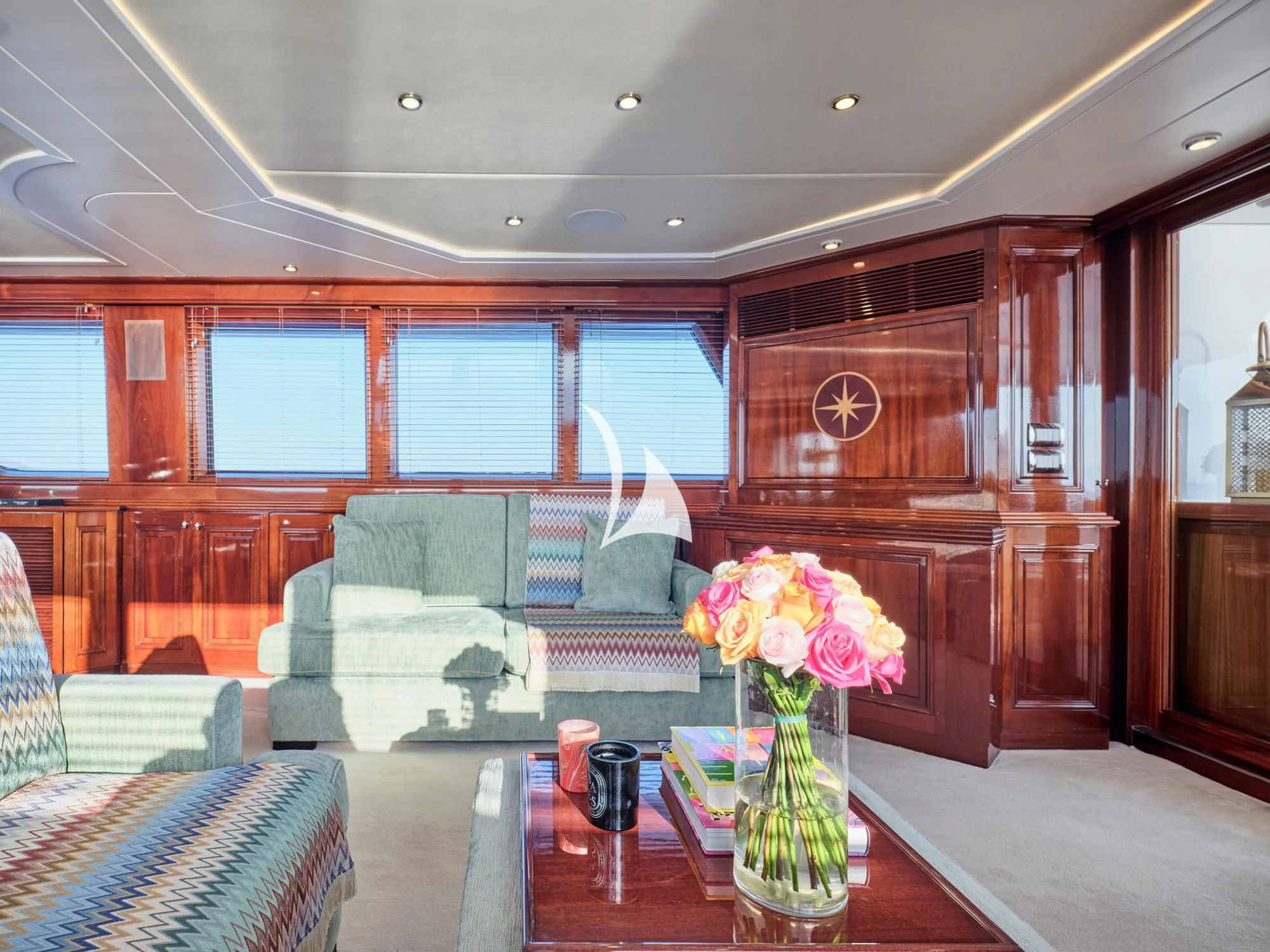a room with a table and chairs aboard MIA ZOI Yacht for Charter