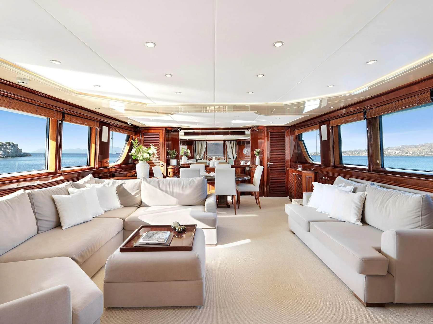 a living room with a couch and a table aboard MIA ZOI Yacht for Charter