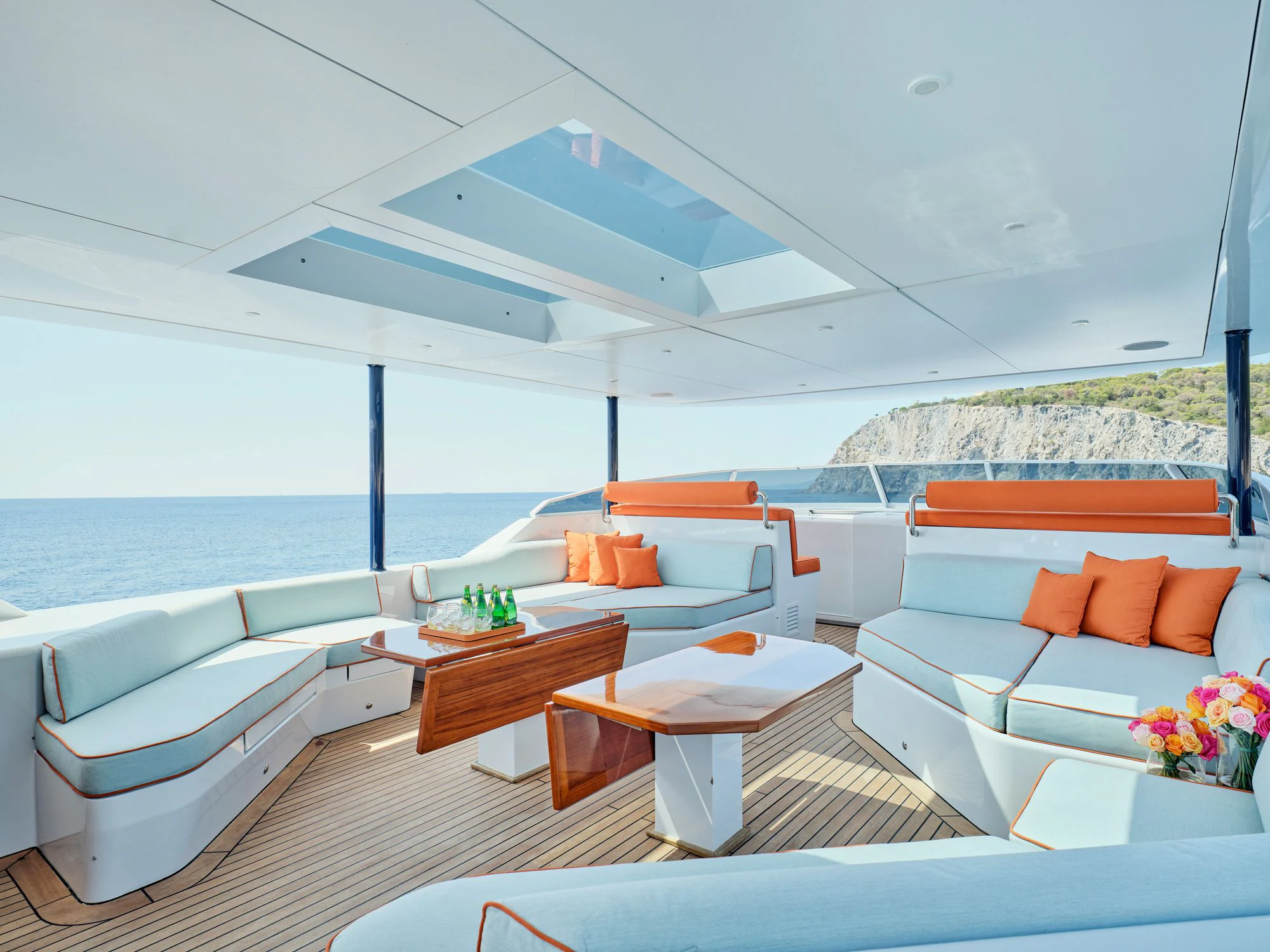 a room with a bed and a table aboard MIA ZOI Yacht for Charter