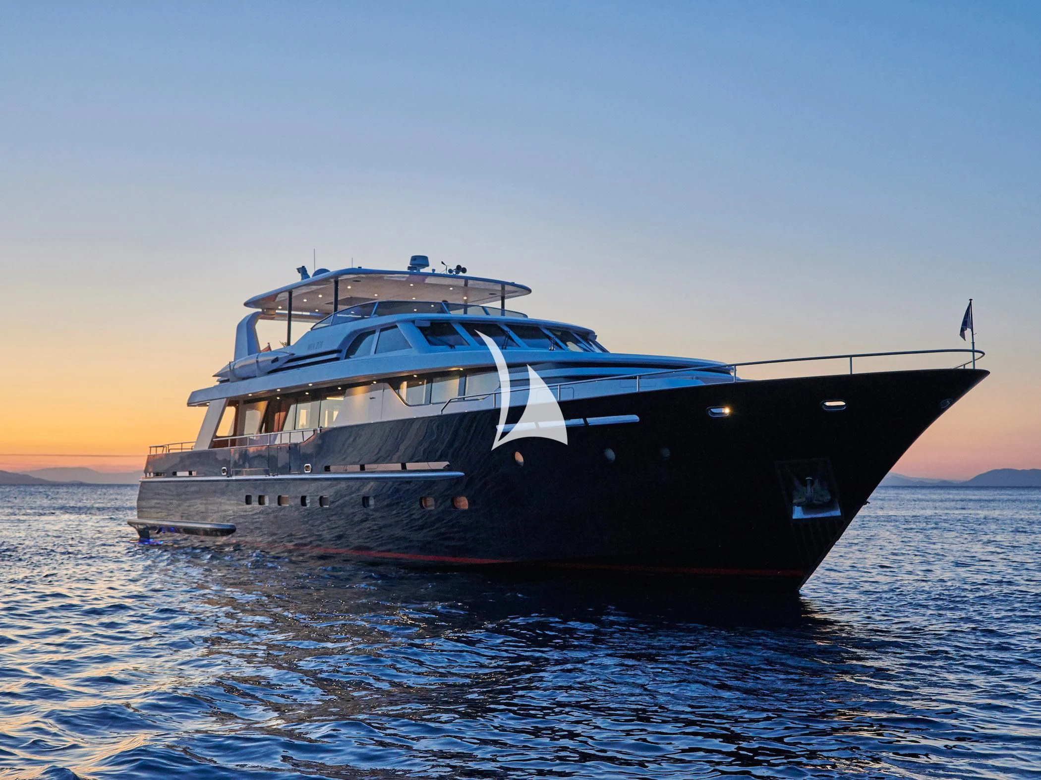 a large boat in the water aboard MIA ZOI Yacht for Charter
