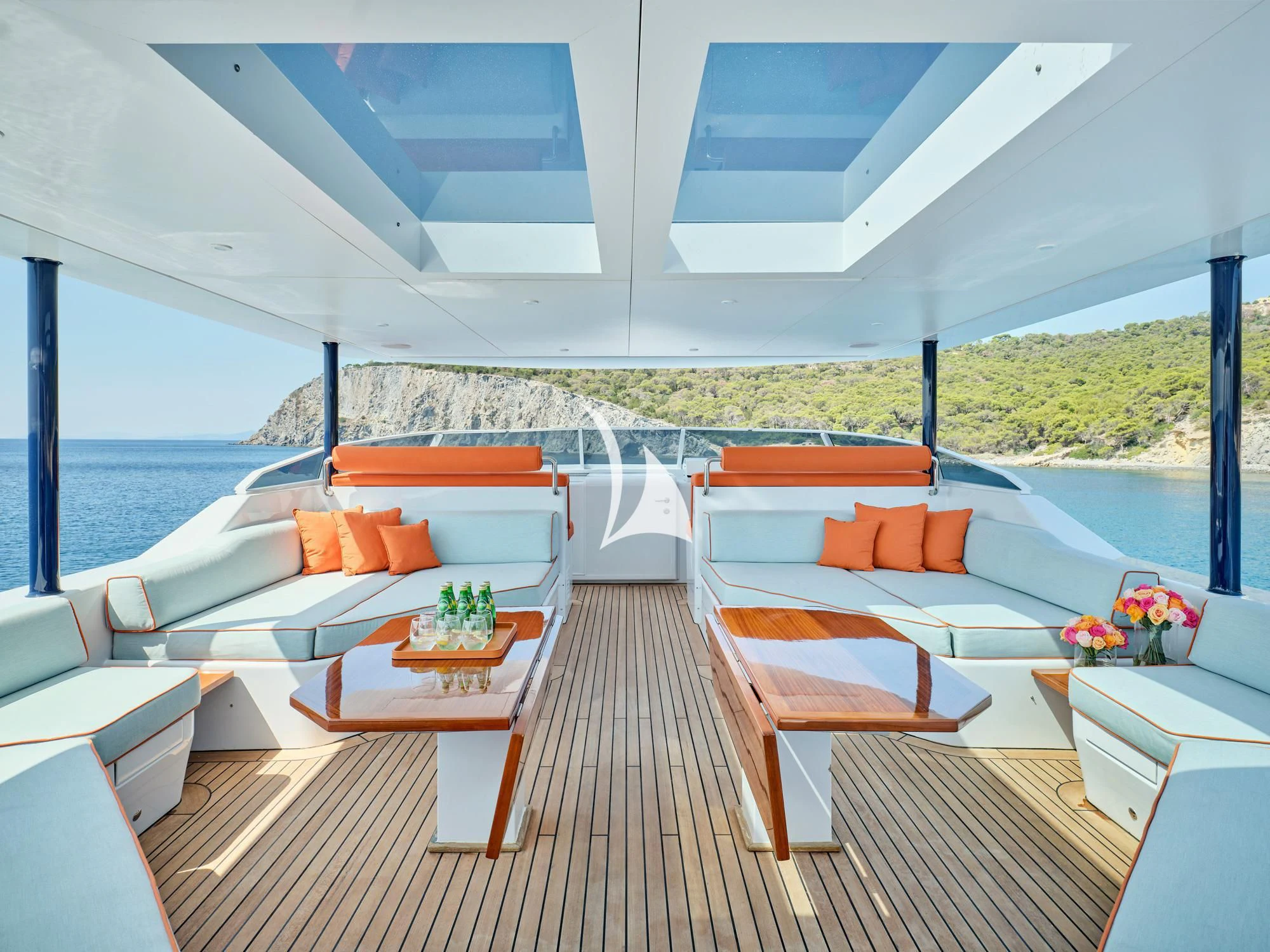 a room with a couch and a pool aboard MIA ZOI Yacht for Charter