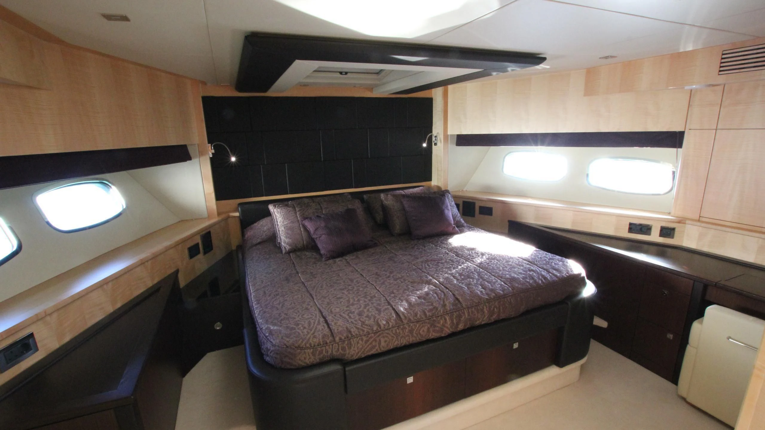 a room with a couch and a television aboard STELLA ANN Yacht for Sale