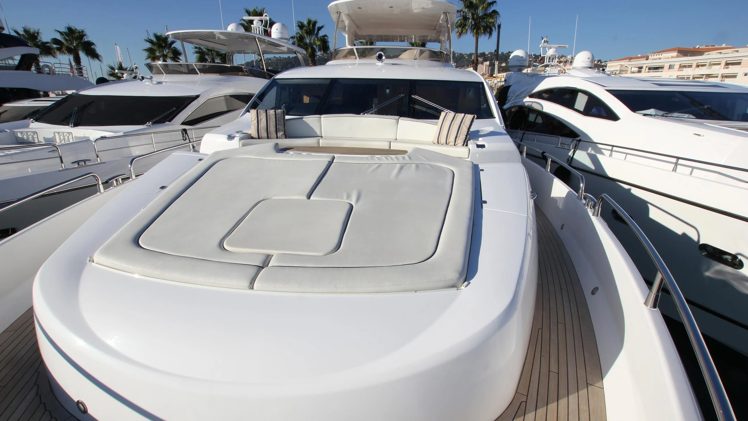 a white car parked in a marina aboard STELLA ANN Yacht for Sale