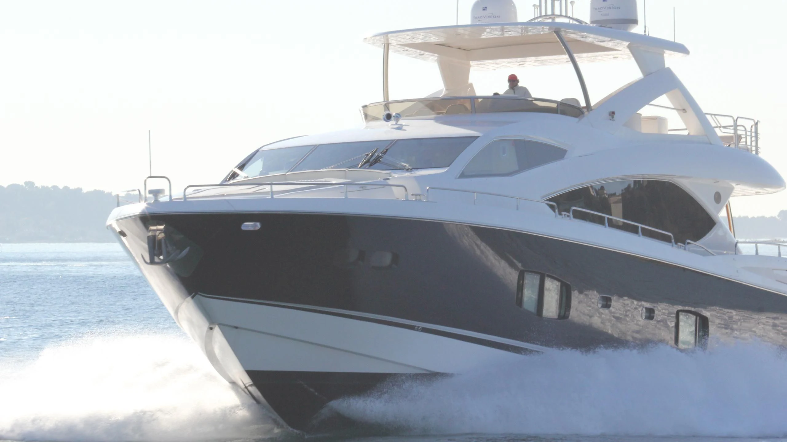 a white yacht on the water aboard STELLA ANN Yacht for Sale
