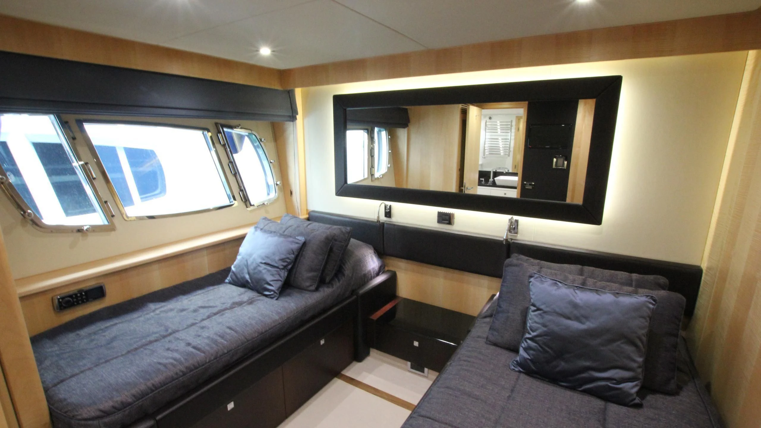 a couch and a television in a room aboard STELLA ANN Yacht for Sale