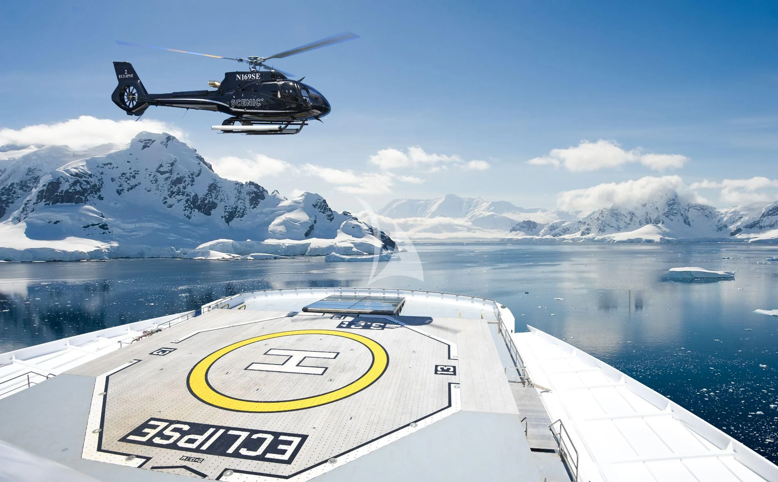 a helicopter flying over a body of water aboard SCENIC ECLIPSE Yacht for Sale