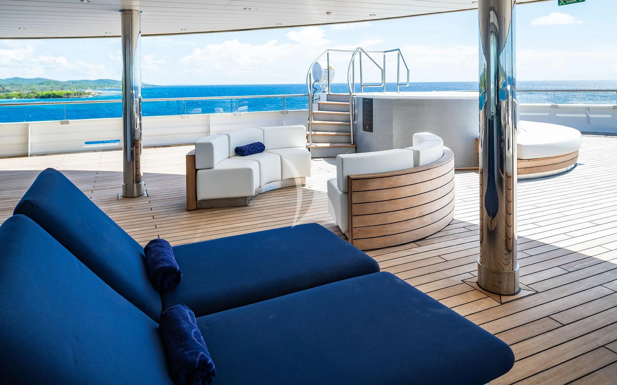 a room with a couch and a table and chairs aboard SCENIC ECLIPSE Yacht for Sale