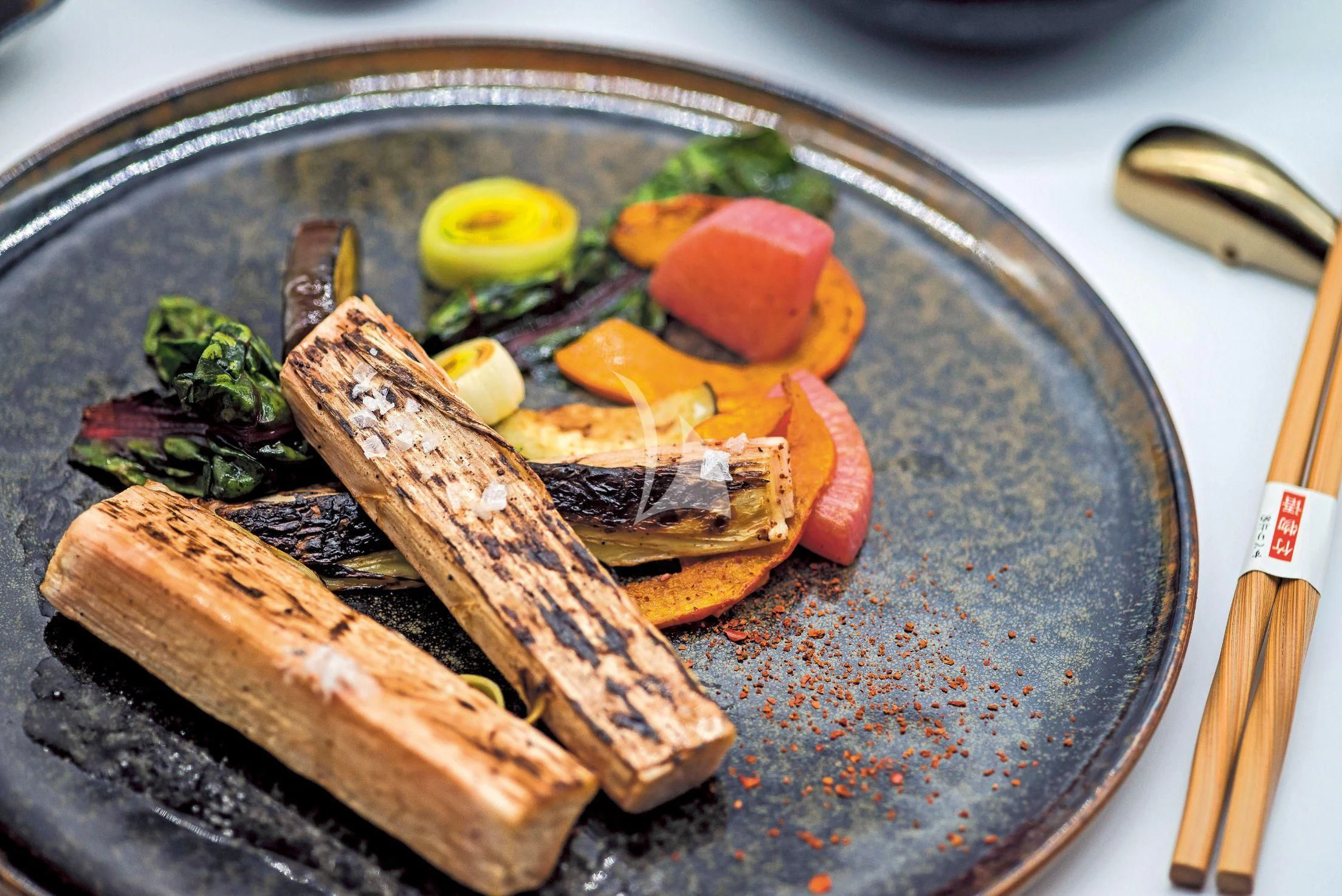 a pan with food in it aboard SCENIC ECLIPSE Yacht for Sale