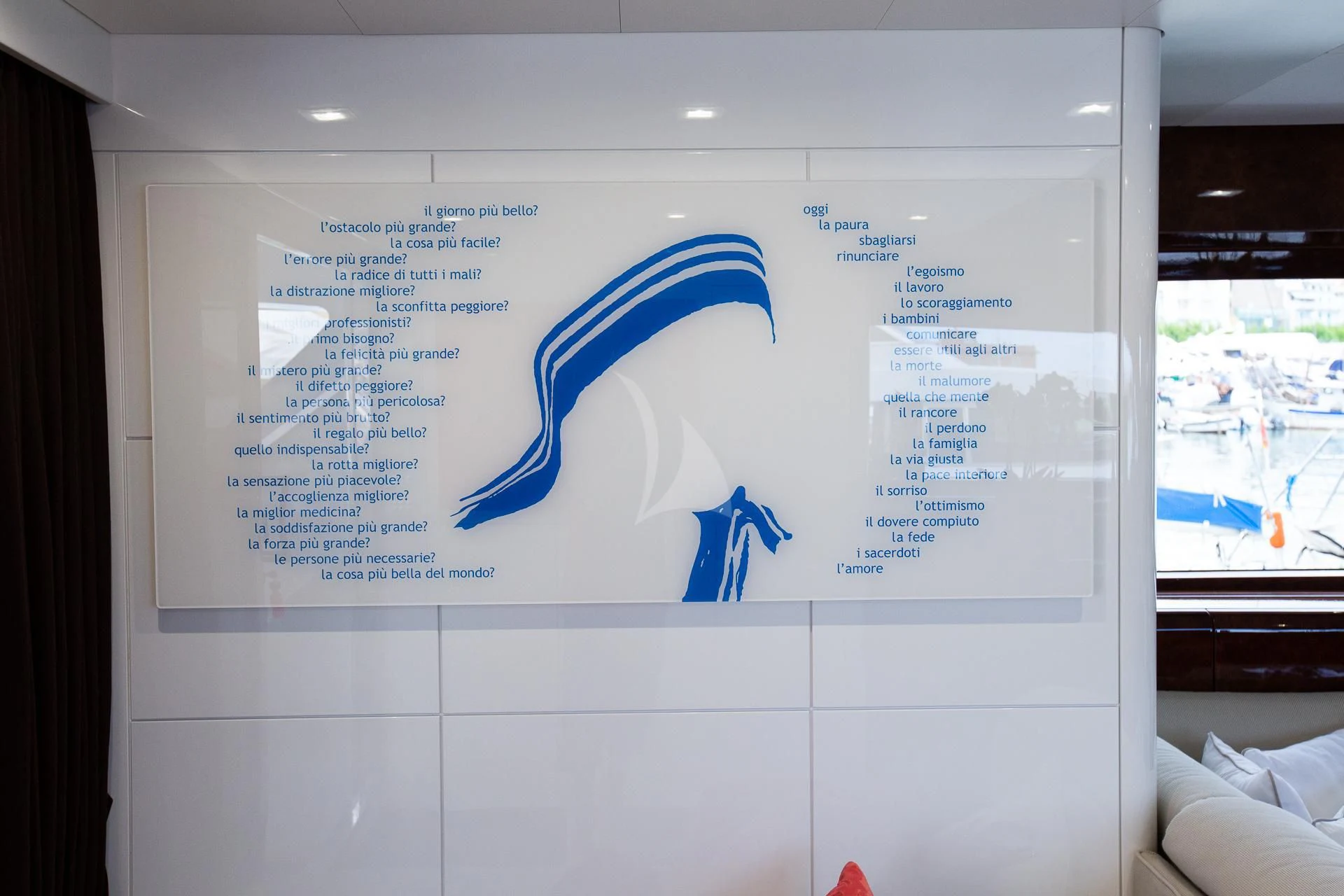 a white board with a blue logo aboard CAMILLA A Yacht for Sale