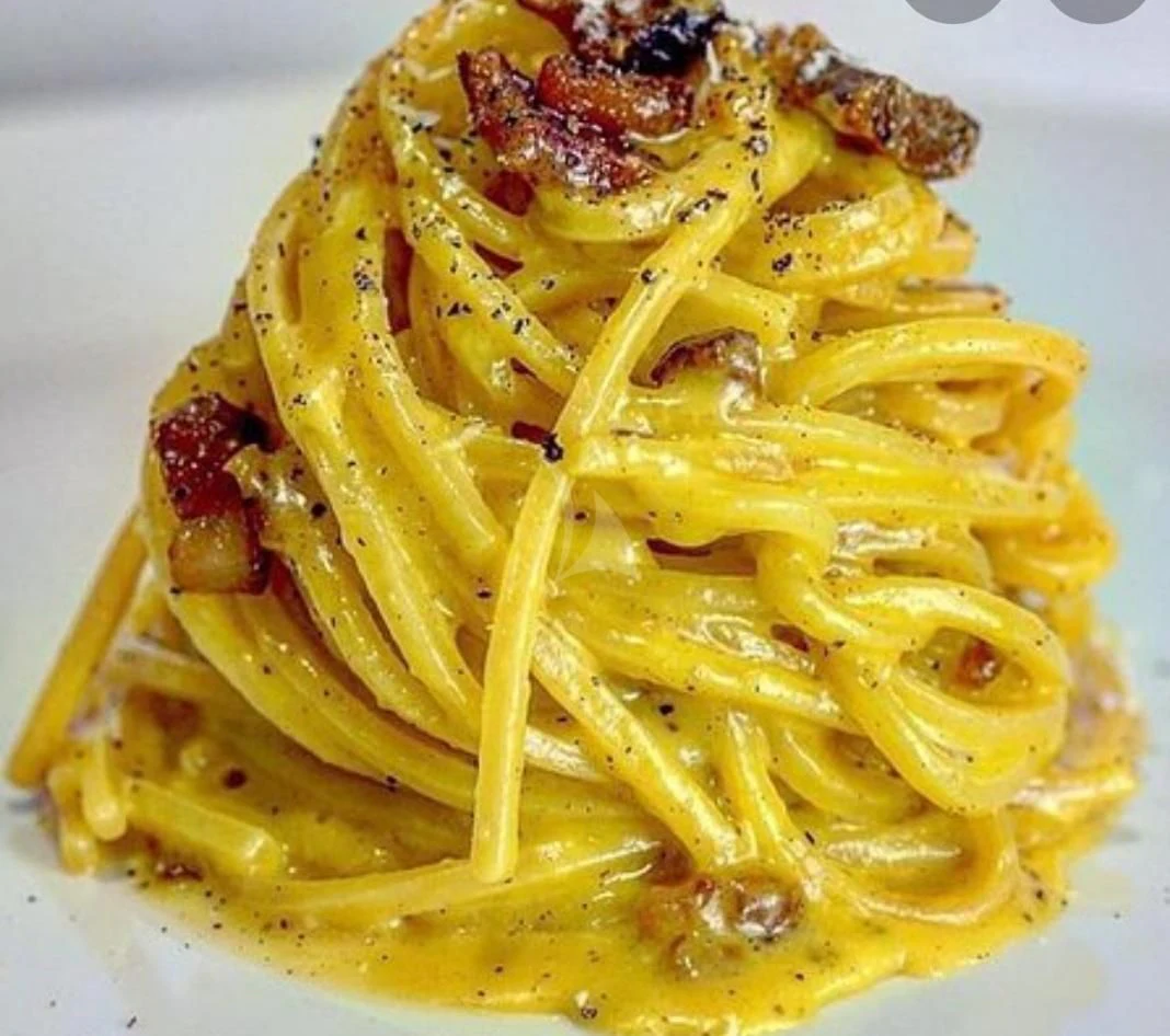 a plate of pasta aboard CAMILLA A Yacht for Sale