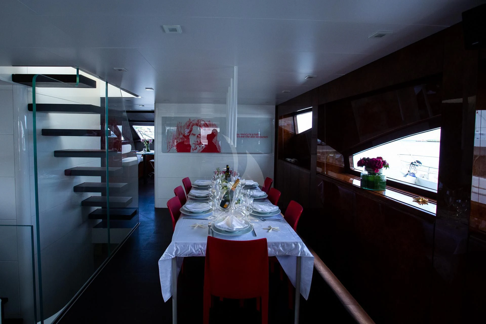 a dining room with a table and chairs aboard CAMILLA A Yacht for Sale