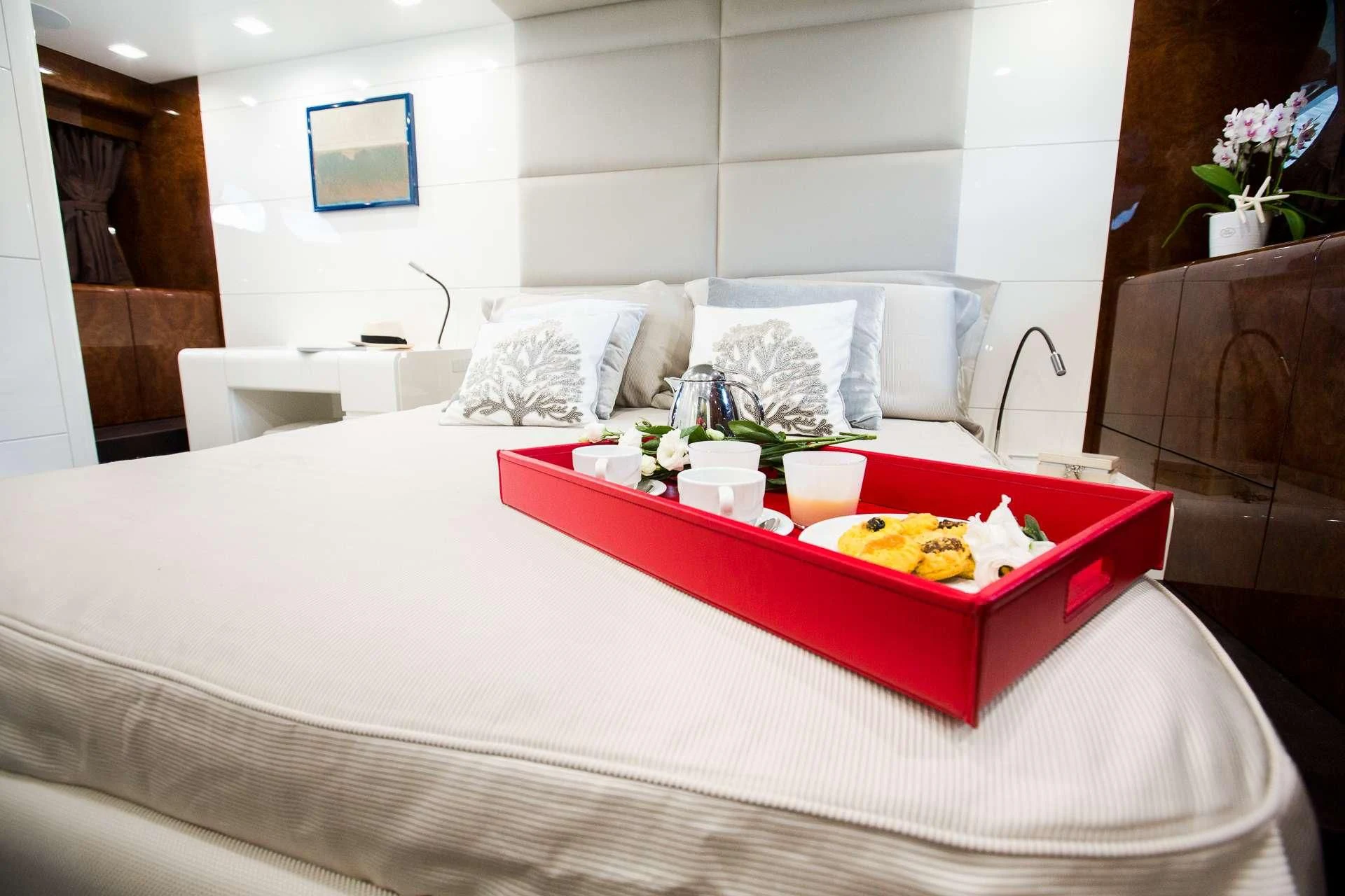 a table with food on it aboard CAMILLA A Yacht for Sale