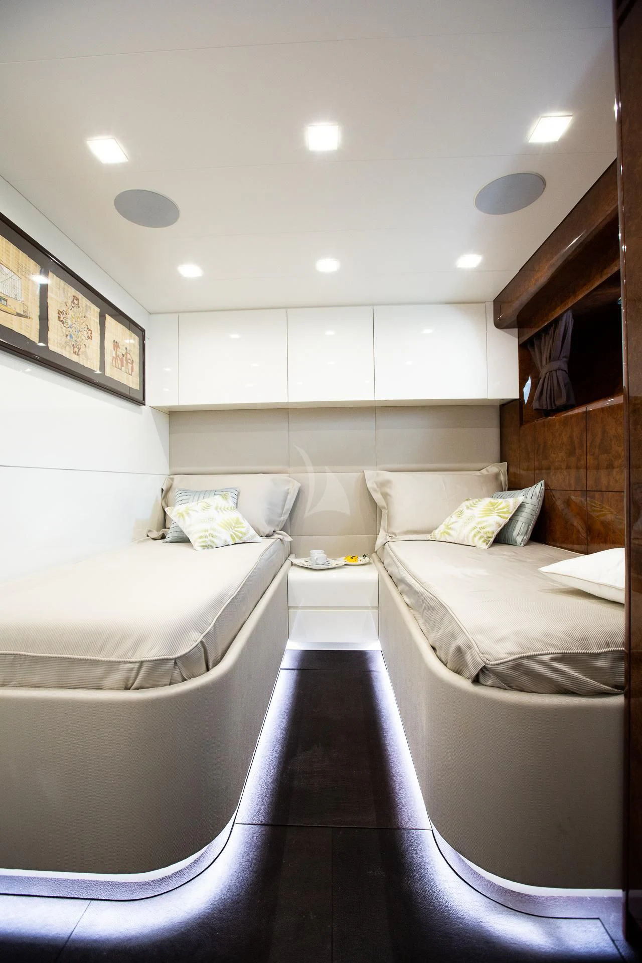 a room with a couple of beds aboard CAMILLA A Yacht for Sale
