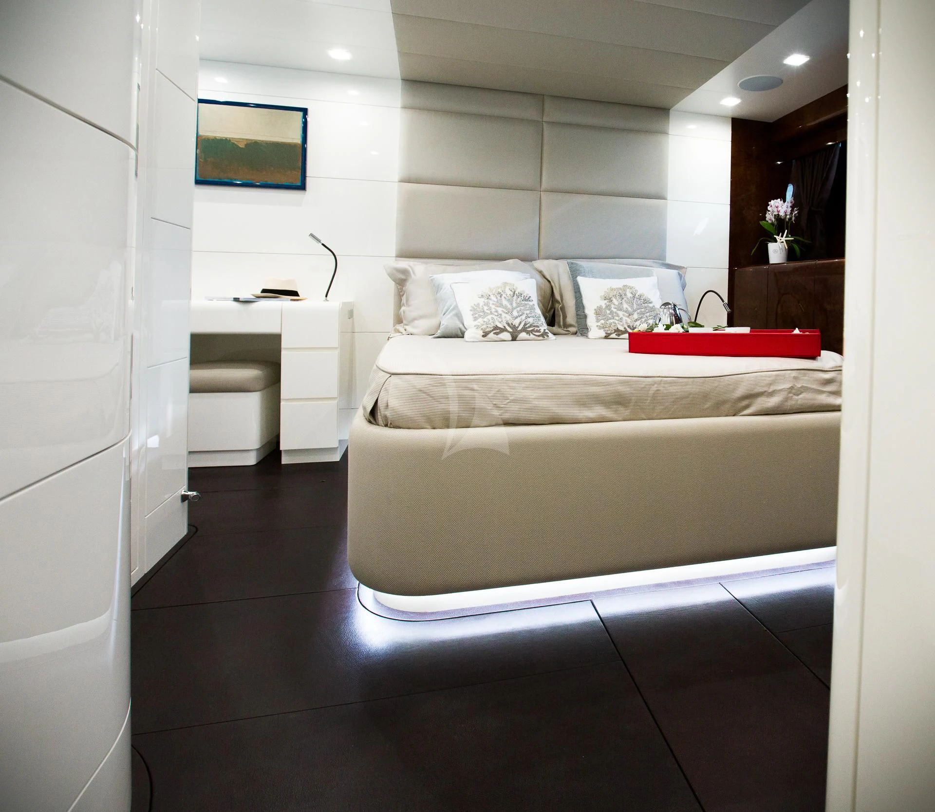 a room with a bed and a tv on the wall aboard CAMILLA A Yacht for Sale