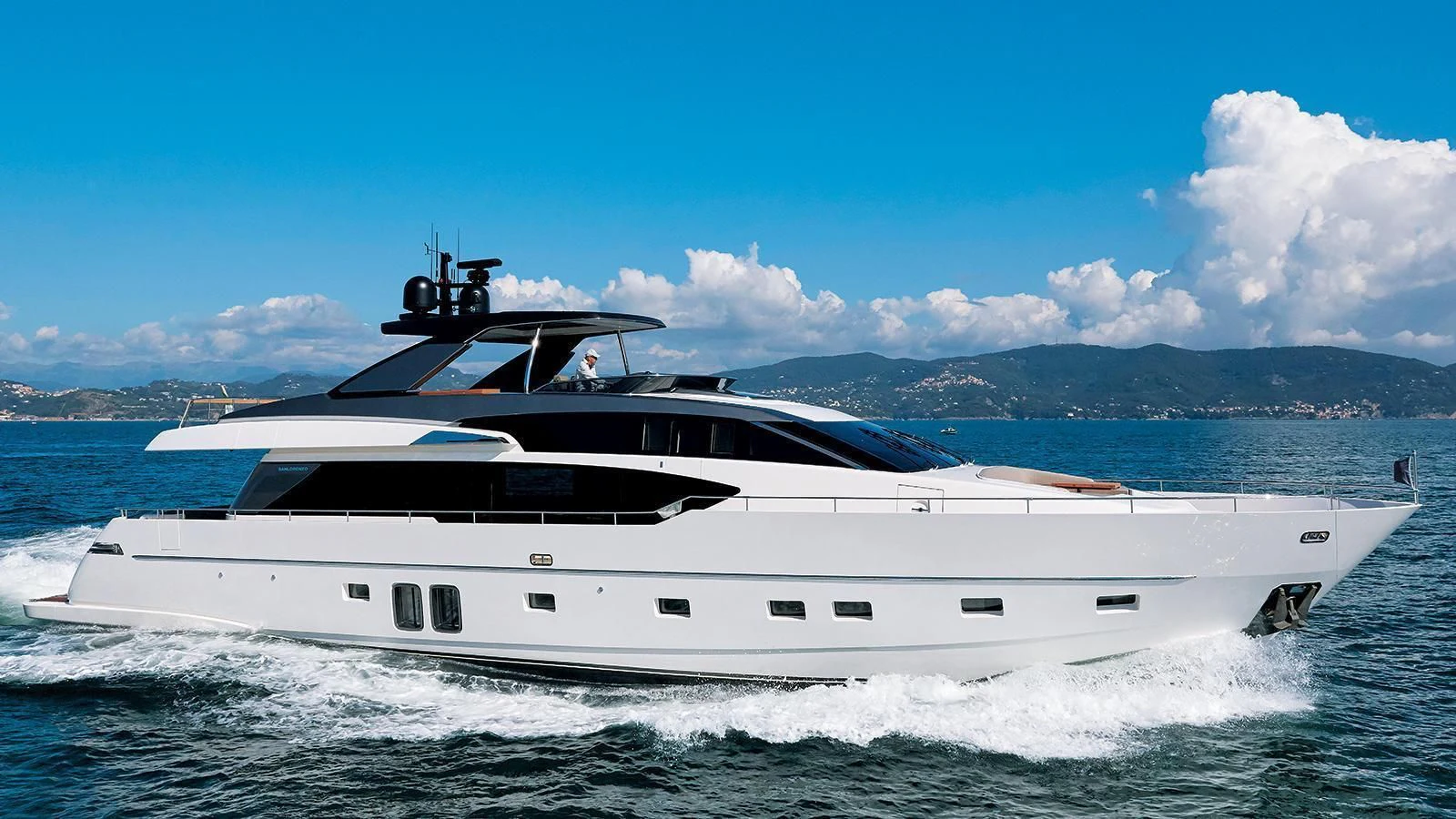 a white yacht on water aboard ROYAL Yacht for Sale