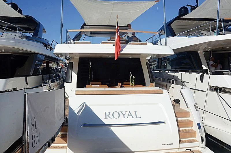 a boat with a red tie on the front aboard ROYAL Yacht for Sale