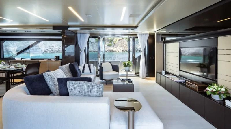 a large white bed in a room aboard THREE GRACES Yacht for Sale