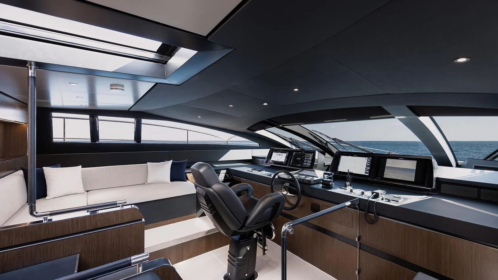 a room with a couch and a table and a chair aboard THREE GRACES Yacht for Sale