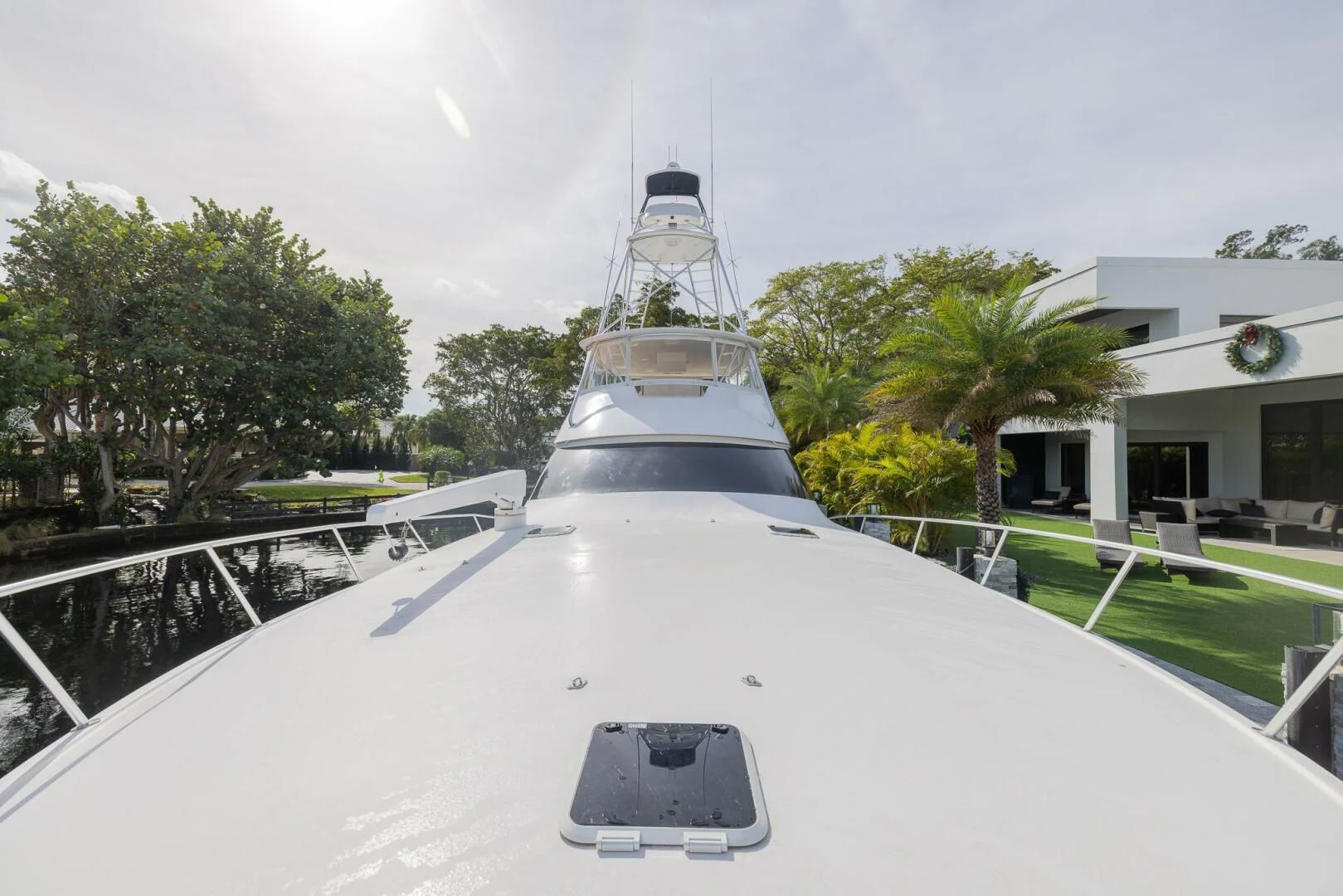 a white boat on a road aboard STABILIZED Yacht for Sale