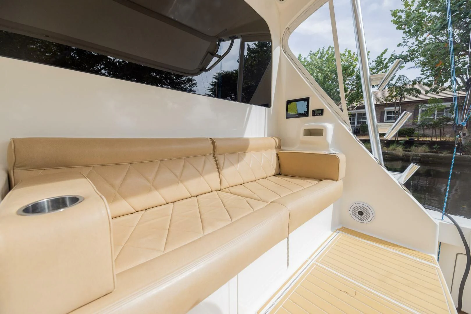 a room with a couch and a window aboard STABILIZED Yacht for Sale