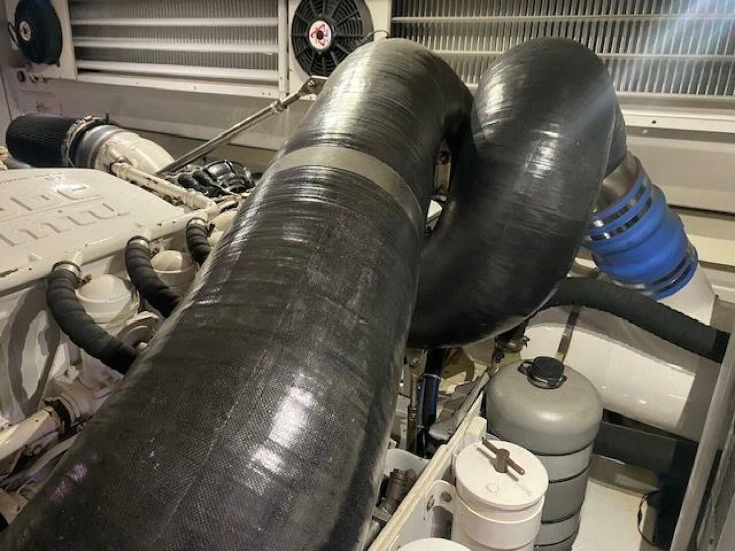 a metal statue of a person in a suit and tie aboard STABILIZED Yacht for Sale