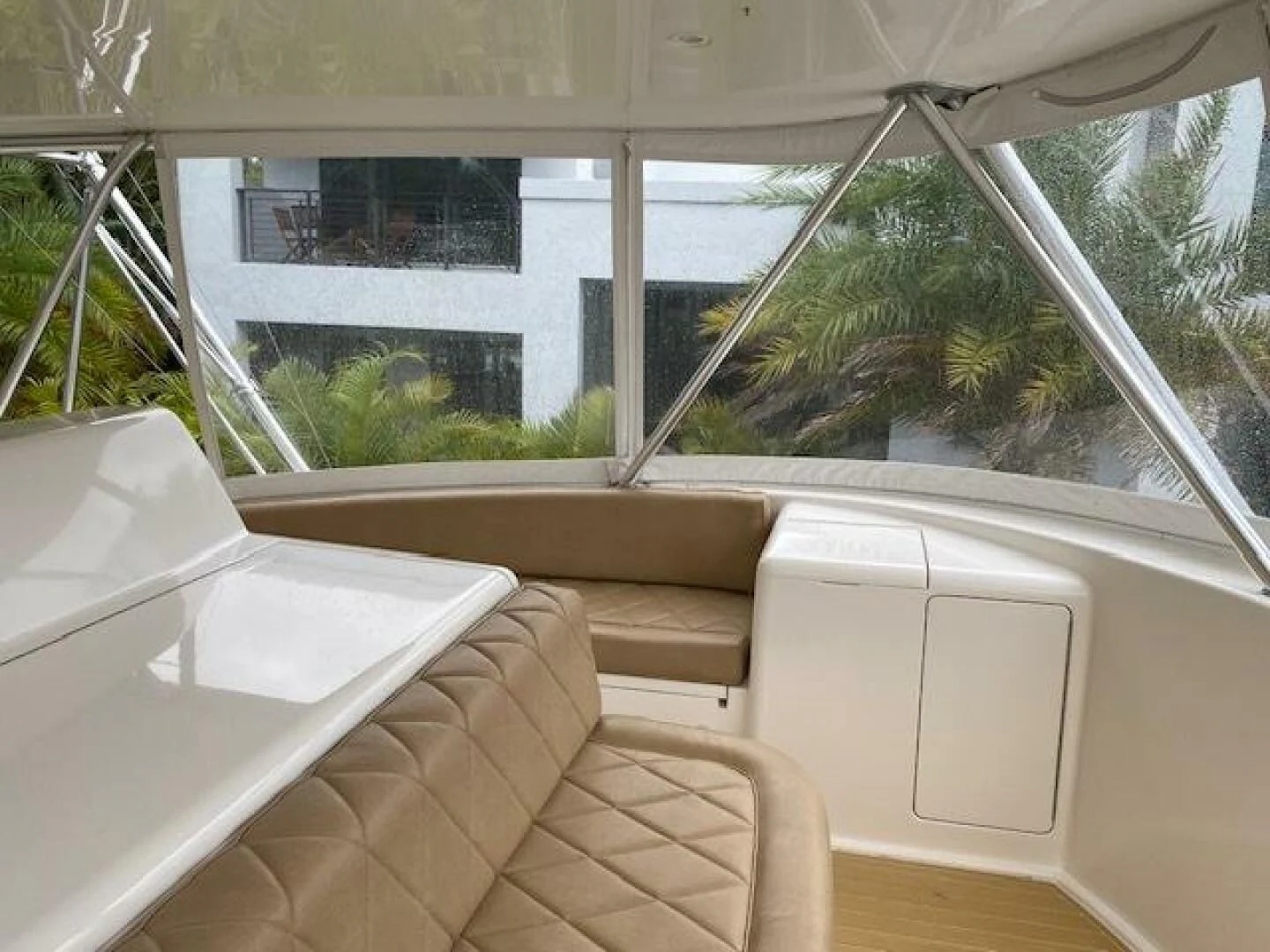 a room with a couch and a window aboard STABILIZED Yacht for Sale