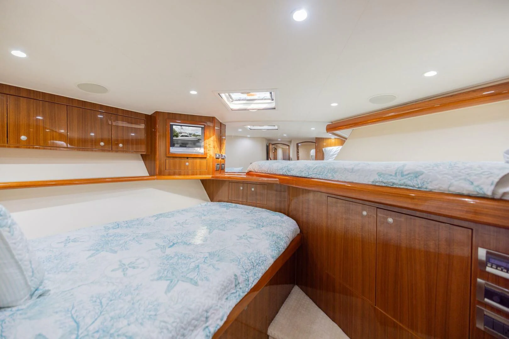a room with wooden cabinets aboard STABILIZED Yacht for Sale