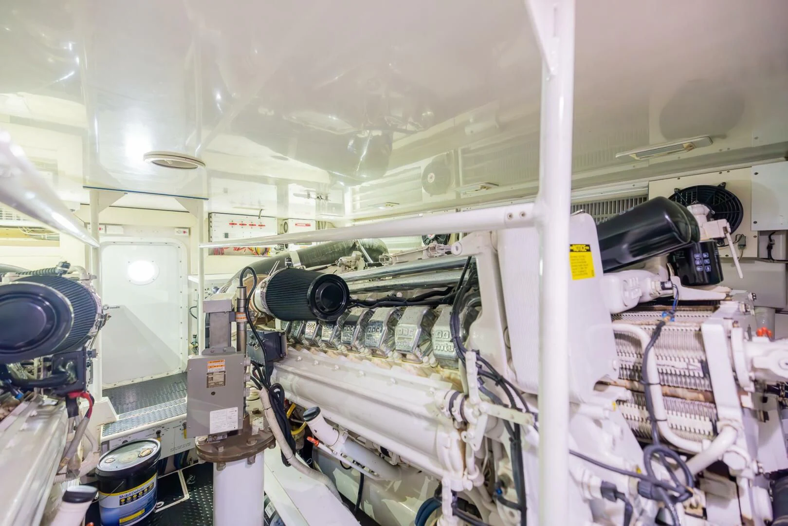 a large white machine with a black handle aboard STABILIZED Yacht for Sale