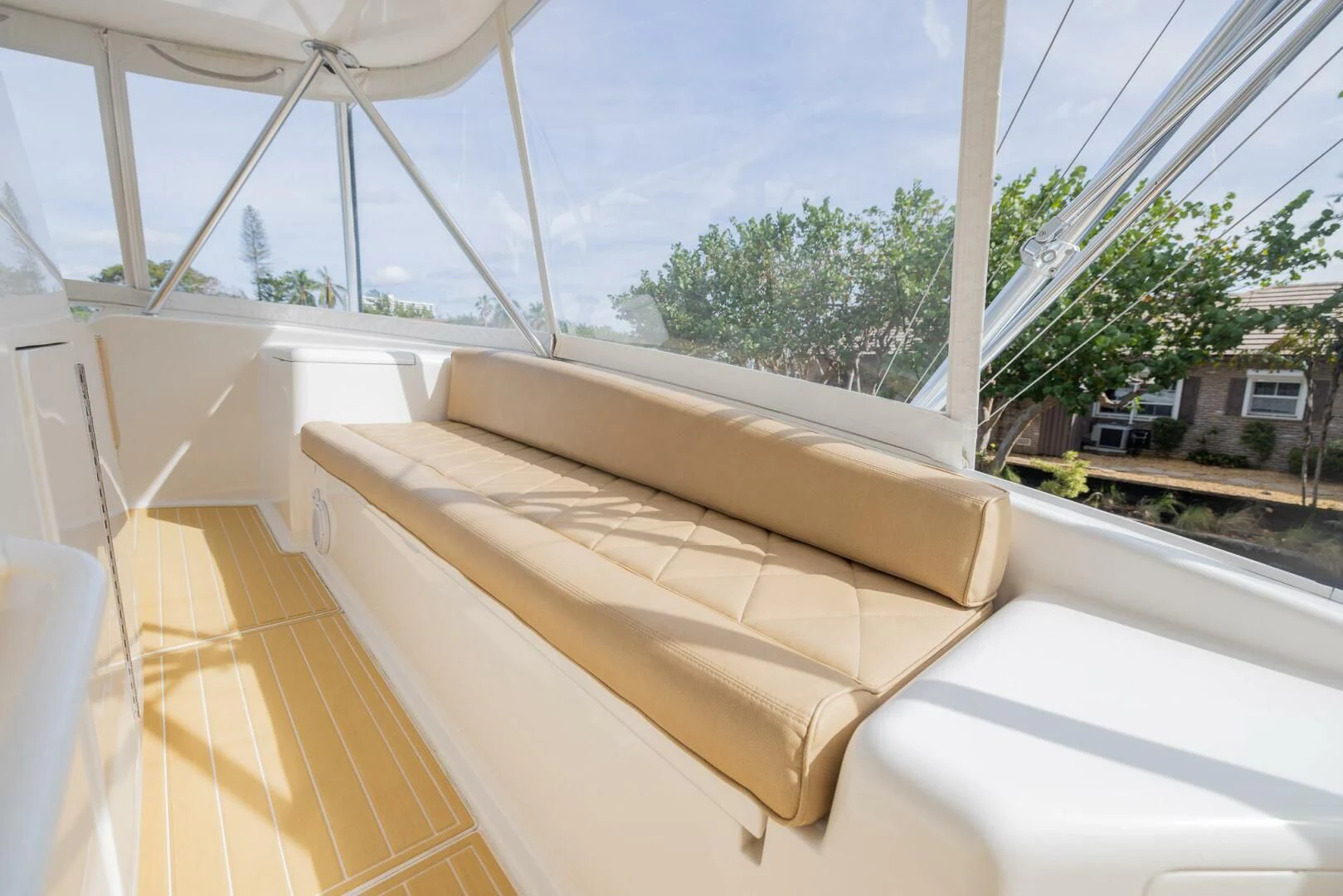 a room with a couch and a window aboard STABILIZED Yacht for Sale