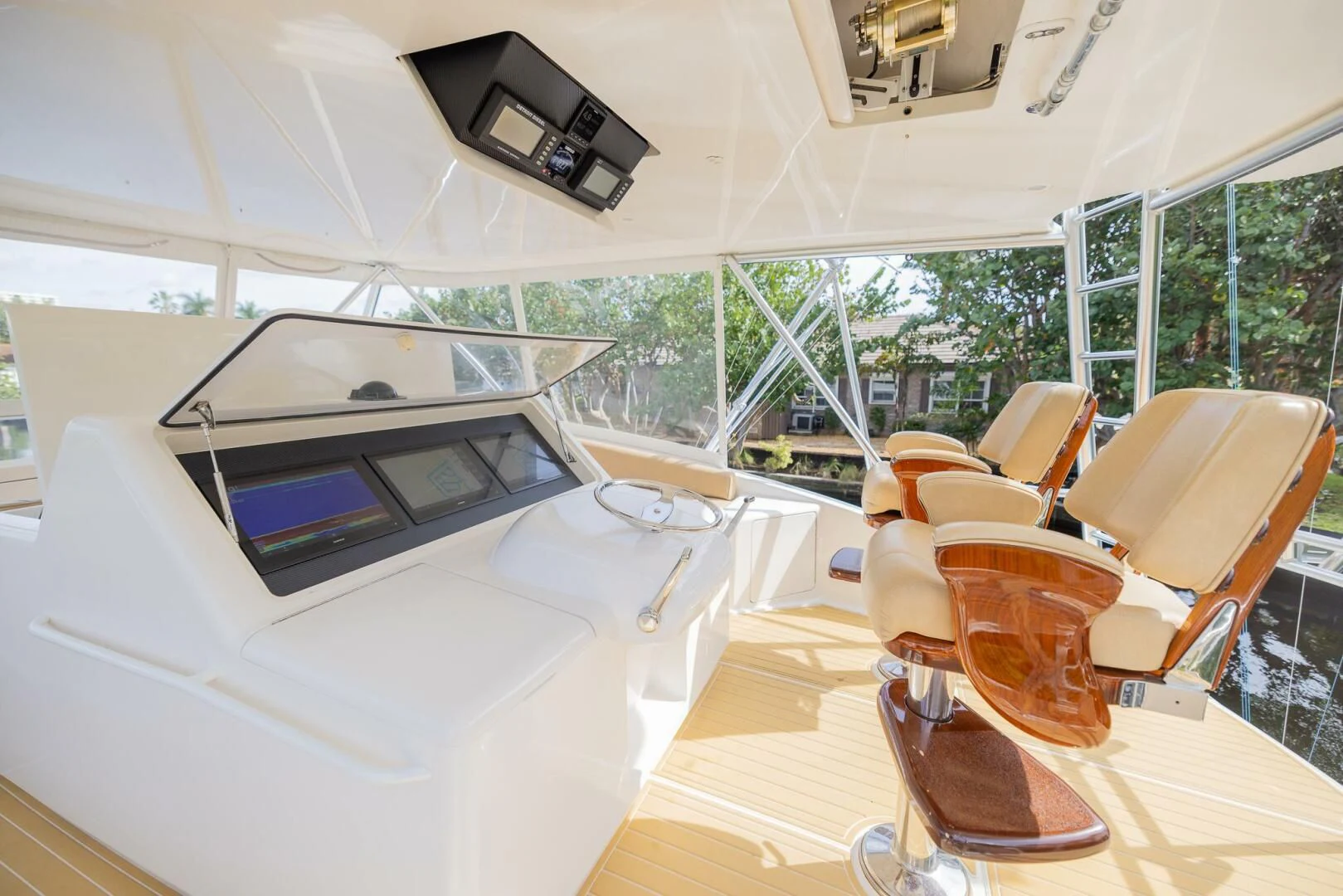 inside of a white car aboard STABILIZED Yacht for Sale