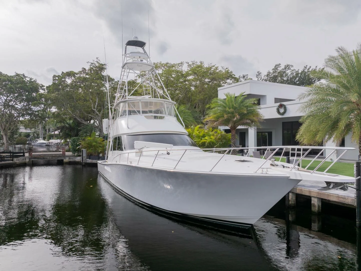 a white boat docked aboard STABILIZED Yacht for Sale