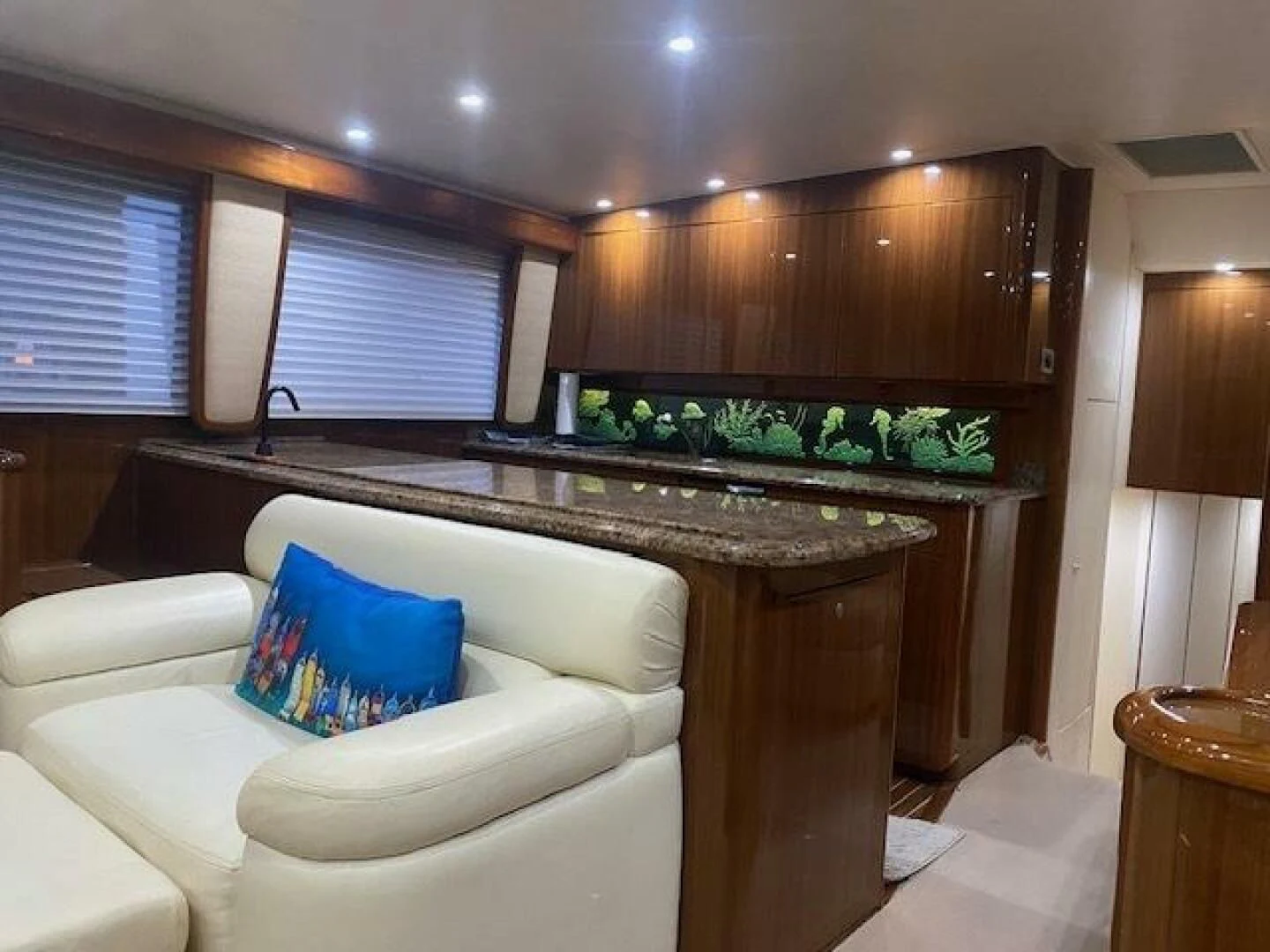 a kitchen with a large island aboard STABILIZED Yacht for Sale